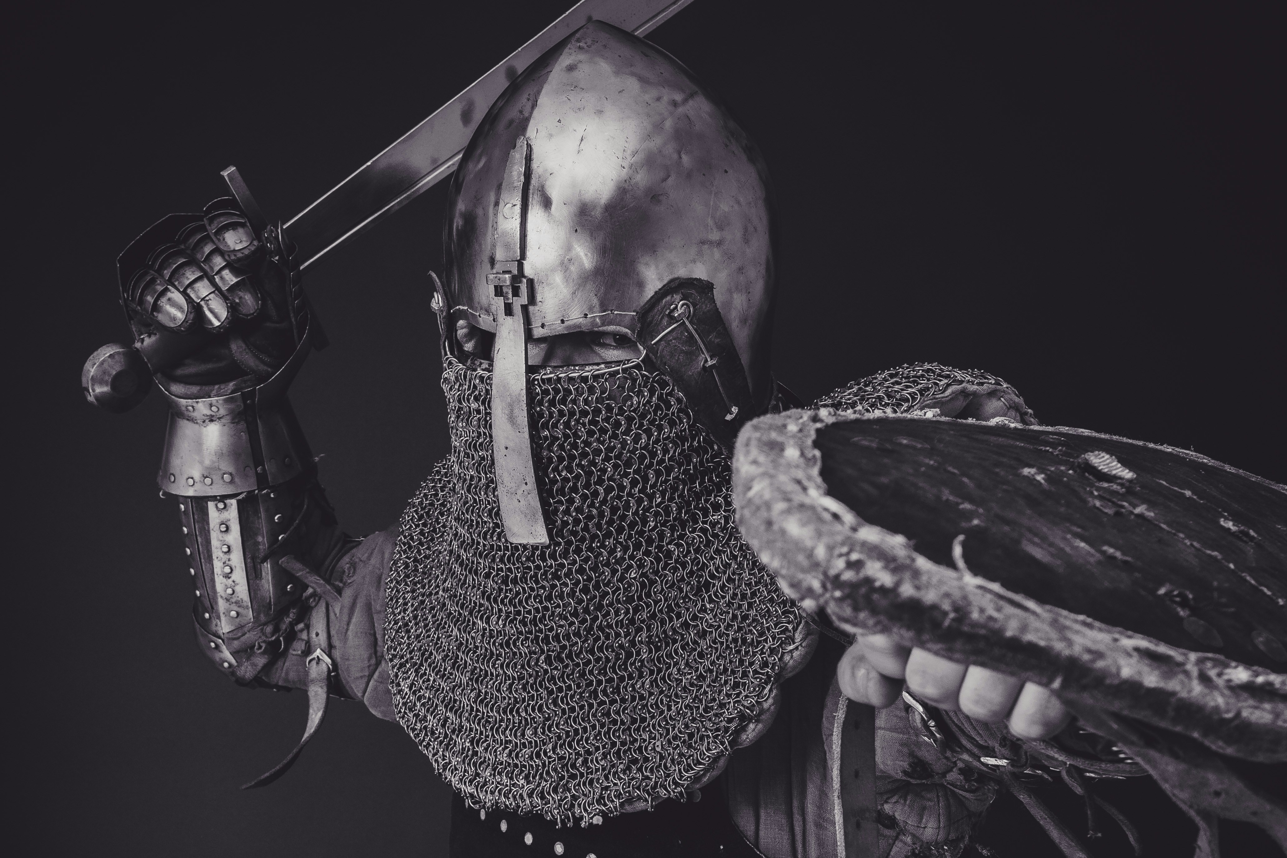 Medieval warrior in armour representing the weekend warrior risk profile